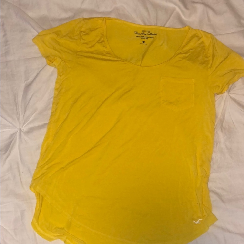 Yellow short sleeves shirt